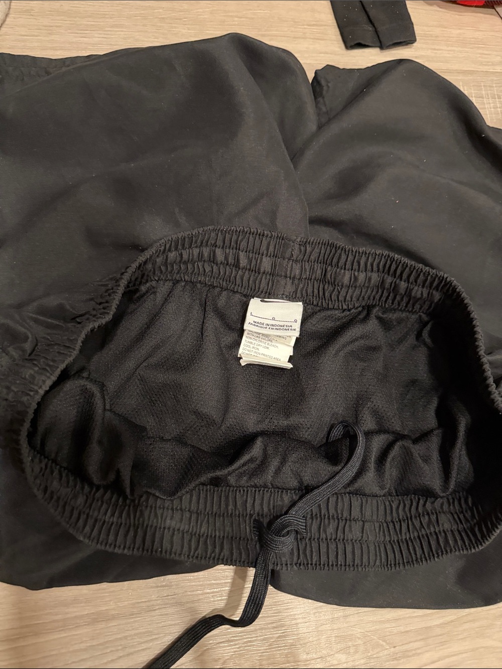 Nike Black men’s Athletic Shorts with White Swoosh - Picture 3 of 5